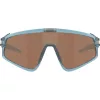 OAKLEY Latch Panel KM Trns Stnws Prizm Tngst